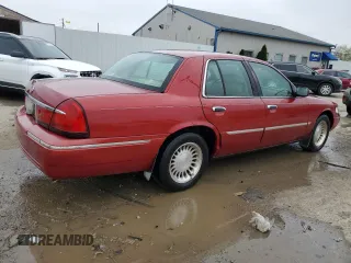 2000 Mercury Grand Marquis LS z VIN 2MEFM75WXYX726819, wystawiony jako Copart lot #52873675 z przebiegiem 144 692 mil mil oraz Nie do naprawy. Historia ofert i sprzedaży dostępna na DreamBid. Obrazek 3.