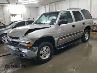 2003 Chevrolet Tahoe LS with VIN 1GNEC13V63J192363, listed as a Copart auction lot 56874325 with 159,462 mi miles and Salvage title. Bid and sale history available at DreamBid. Image 1.
