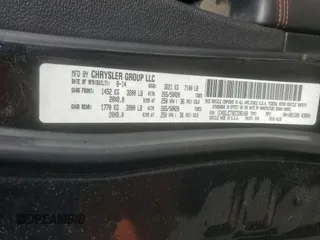 2014 Dodge Durango R/T with VIN 1C4SDJCT9EC596160, listed as a Copart auction lot 58034505 with 140,674 mi miles and Salvage title. Bid and sale history available at DreamBid. Image 13.