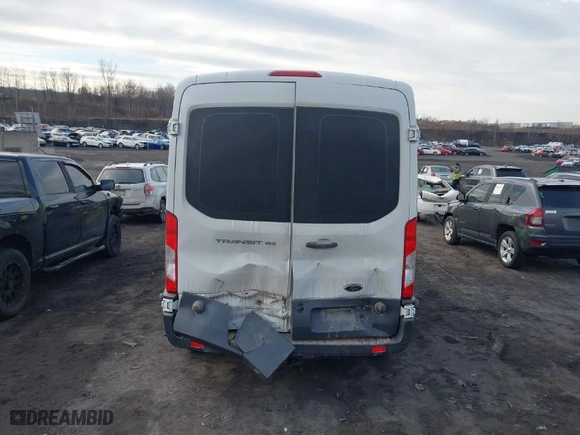 2016 Ford Transit Van with VIN 1FTYE2CMXGKA31057, listed as a IAAI auction lot 41598779 with NaN miles. Bid and sale history available at carsss.com. Image 16.