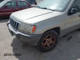 2003 Jeep Grand Cherokee Laredo with VIN 1J4GX48S73C515727, listed as a IAAI auction lot 42555080 with 275,035 mi miles and . Bid and sale history available at DreamBid. Image 6.