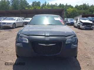 2015 Chrysler 300 with VIN 2C3CCABG1FH807740, listed as a IAAI auction lot 40246268 with 174,037 mi miles. Bid and sale history available at carsss.com. Image 6.