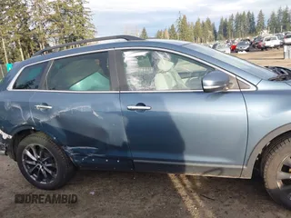 2014 Mazda CX-9 Grand Touring with VIN JM3TB3DV2E0435230, listed as a IAAI auction lot 41041440 with 145,538 mi miles and . Bid and sale history available at DreamBid. Image 14.