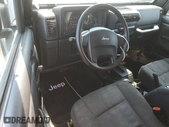 2005 Jeep Wrangler Sport с VIN 1J4FA49SX5P317067, выставлен на аукционе Copart как лот 60627125 с пробегом 170 700 миль миль и Чистый • Clean title. История ставок и продаж доступна на DreamBid. Изображение 8.