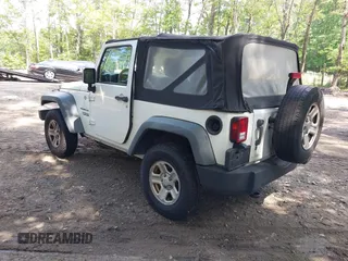 2012 Jeep Wrangler Sport with VIN 1C4AJWAG7CL192200, listed as a IAAI auction lot 42472398 with 198,999 mi miles and . Bid and sale history available at DreamBid. Image 3.