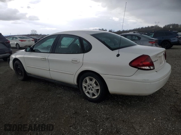 2005 Ford Taurus SE with VIN 1FAFP53215A238754, listed as a Copart auction lot 49338715 with 214,694 mi miles and Salvage Title. Bid and sale history available at carsss.com. Image 2.