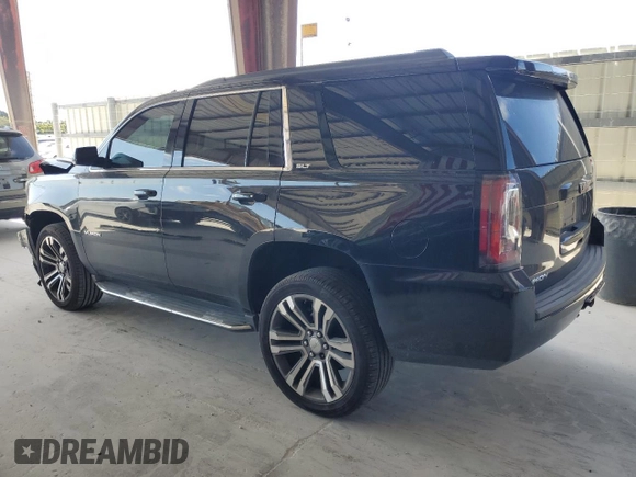 2016 GMC Yukon SLT with VIN 1GKS1BKC1GR363605, listed as a Copart auction lot 54324285 with 167,921 mi miles and Salvage Title. Bid and sale history available at carsss.com. Image 2.