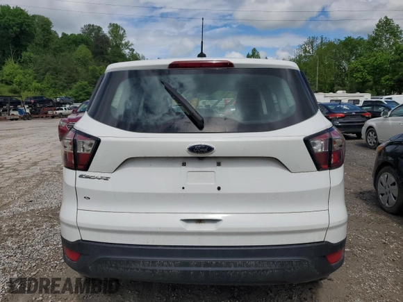 2018 Ford Escape S with VIN 1FMCU0F79JUB26918, listed as a Copart auction lot 56510775 with 184,176 mi miles and Salvage title. Bid and sale history available at DreamBid. Image 6.