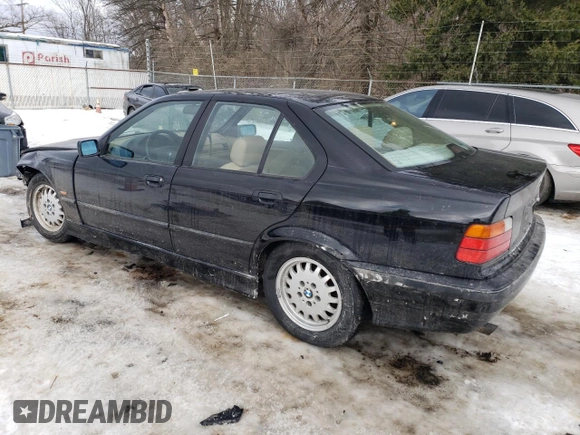 1998 BMW 3 Series 318i with VIN WBACC9329WEE60890, listed as a Copart auction lot 42497055 with 138,346 mi miles and Salvage Title. Bid and sale history available at carsss.com. Image 2.