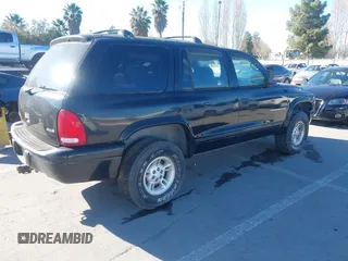 1999 Dodge Durango z VIN 1B4HS28Z4XF612380, wystawiony jako IAAI lot #41283684 z przebiegiem 133 226 mil mil oraz . Historia ofert i sprzedaży dostępna na DreamBid. Obrazek 4.