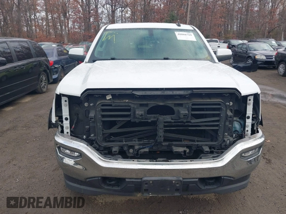 2017 GMC Sierra 1500 SLE z VIN 1GTV2MEC0HZ311932, wystawiony jako IAAI lot #40888769 z przebiegiem 72 676 mil mil oraz . Historia ofert i sprzedaży dostępna na DreamBid. Obrazek 12.