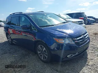 2015 Honda Odyssey Touring Elite with VIN 5FNRL5H92FB116051, listed as a IAAI auction lot 42591661 with 152,313 mi miles and . Bid and sale history available at DreamBid. Image 1.