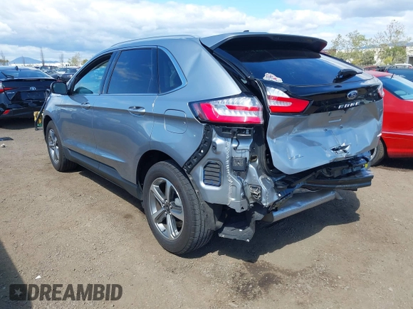 2024 Ford Edge SEL z VIN 2FMPK4J9XRBA43703, wystawiony jako IAAI lot #42064393 z przebiegiem 15 522 mil mil oraz . Historia ofert i sprzedaży dostępna na DreamBid. Obrazek 3.