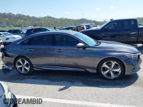 2019 Honda Accord Touring with VIN 1HGCV2F92KA016179, listed as a IAAI auction lot 41975156 with 101,674 mi miles and . Bid and sale history available at DreamBid. Image 14.