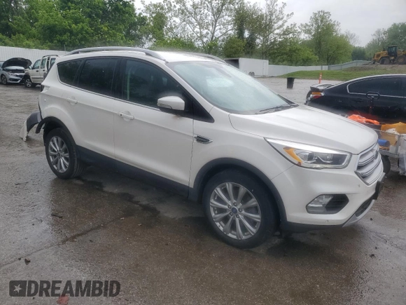 2018 Ford Escape Titanium z VIN 1FMCU9J94JUB49827, wystawiony jako Copart lot #55697385 z przebiegiem 98 682 mil mil oraz Szkoda całkowita • Salvage title. Historia ofert i sprzedaży dostępna na DreamBid. Obrazek 4.