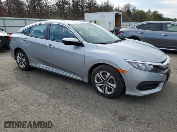 2017 Honda Civic LX z VIN 2HGFC2F52HH551152, wystawiony jako Copart lot #52728275 z przebiegiem 64 376 mil mil oraz Szkoda całkowita • Salvage title. Historia ofert i sprzedaży dostępna na DreamBid. Obrazek 4.