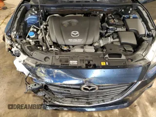 2016 Mazda 3 i Touring z VIN JM1BM1V73G1348484, wystawiony jako Copart lot #60684625 z przebiegiem 58 770 mil mil oraz Szkoda całkowita • Salvage title. Historia ofert i sprzedaży dostępna na DreamBid. Obrazek 11.