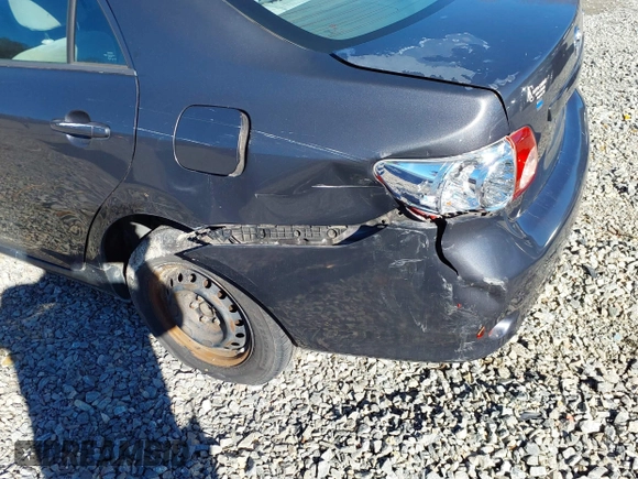 2010 Toyota Corolla with VIN 2T1BU4EE3AC316203, listed as a IAAI auction lot 35972106 with 198,544 mi miles. Bid and sale history available at carsss.com. Image 6.