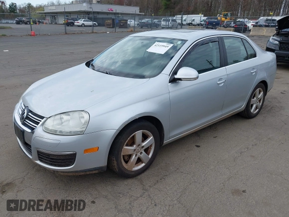 2009 Volkswagen Jetta Sedan SE with VIN 3VWRZ71K09M122435, listed as a IAAI auction lot 42119949 with 158,207 mi miles. Bid and sale history available at carsss.com. Image 2.