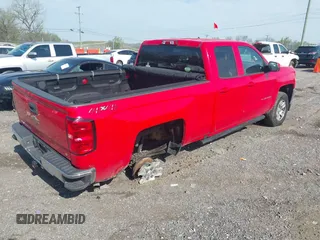 2018 Chevrolet Silverado 1500 LT with VIN 1GCVKREH2JZ264045, listed as a IAAI auction lot 42020426 with 135,719 mi miles and . Bid and sale history available at DreamBid. Image 4.