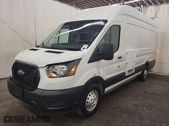 2023 Ford Transit Cargo with VIN 1FTBW3U84PKB20116, listed as a IAAI auction lot 42748031 with 6,591 mi miles and . Bid and sale history available at DreamBid. Image 16.