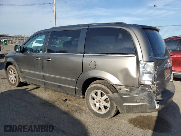 2010 Chrysler Town & Country Touring Plus with VIN 2A4RR8DX2AR358284, listed as a Copart auction lot 54311385 with 169,384 mi miles and Salvage Title. Bid and sale history available at DreamBid. Image 2.
