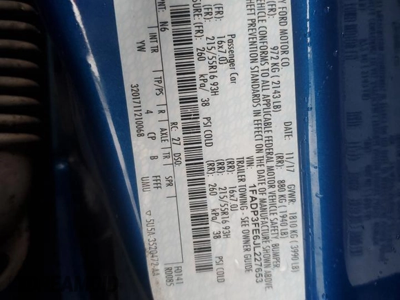 2018 Ford Focus SE z VIN 1FADP3FE6JL227653, wystawiony jako Copart lot #56827585 z przebiegiem Nie podano mil oraz Szkoda całkowita • Salvage title. Historia ofert i sprzedaży dostępna na DreamBid. Obrazek 12.