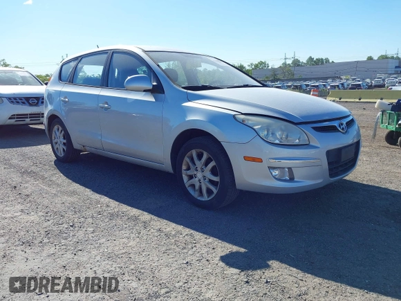 2009 Hyundai Elantra Touring z VIN KMHDC86E99U033025, wystawiony jako IAAI lot #42301392 z przebiegiem 154 455 mil mil oraz . Historia ofert i sprzedaży dostępna na DreamBid. Obrazek 1.
