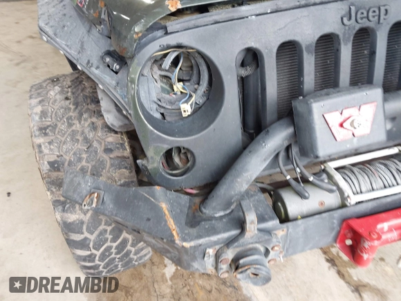 2007 Jeep Wrangler X z VIN 1J4GA39107L132865, wystawiony jako IAAI lot #42252972 z przebiegiem 101 114 mil mil oraz . Historia ofert i sprzedaży dostępna na DreamBid. Obrazek 6.