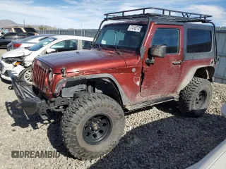 2007 Jeep Wrangler Rubicon with VIN 1J4GA64157L129114, listed as a Copart auction lot 77416214 with 140,460 mi miles and Salvage Title. Bid and sale history available at carsss.com. Image 1.