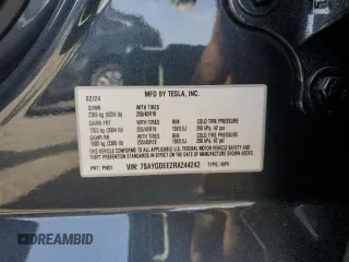2024 Tesla Model Y Long Range with VIN 7SAYGDEE2RA244242, listed as a Copart auction lot 52635095 with 4,994 mi miles and Salvage title. Bid and sale history available at DreamBid. Image 15.