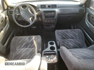 1999 Honda CR-V LX with VIN JHLRD1849XC083285, listed as a Copart auction lot 59909904 with 127,759 mi miles and Salvage Title. Bid and sale history available at carsss.com. Image 8.