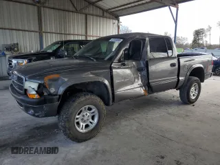 2002 Dodge Dakota Sport with VIN 1B7HG38N12S515919, listed as a Copart auction lot 42930835 with 180,701 mi miles and Salvage Title. Bid and sale history available at carsss.com. Image 1.