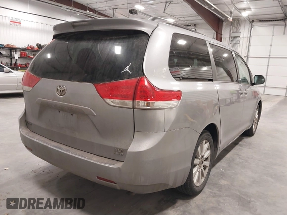 2011 Toyota Sienna XLE z VIN 5TDDK3DC4BS003792, wystawiony jako IAAI lot #41762481 z przebiegiem 201 051 mil mil oraz . Historia ofert i sprzedaży dostępna na DreamBid. Obrazek 4.