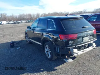 2018 Audi Q7 Premium z VIN WA1AHAF79JD018461, wystawiony jako IAAI lot #41880373 z przebiegiem 107 346 mil mil oraz . Historia ofert i sprzedaży dostępna na DreamBid. Obrazek 3.