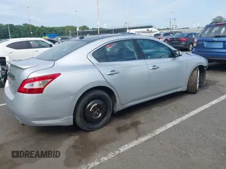 2010 Nissan Maxima SV with VIN 1N4AA5AP6AC826979, listed as a IAAI auction lot 42589811 with 154,724 mi miles and . Bid and sale history available at DreamBid. Image 4.
