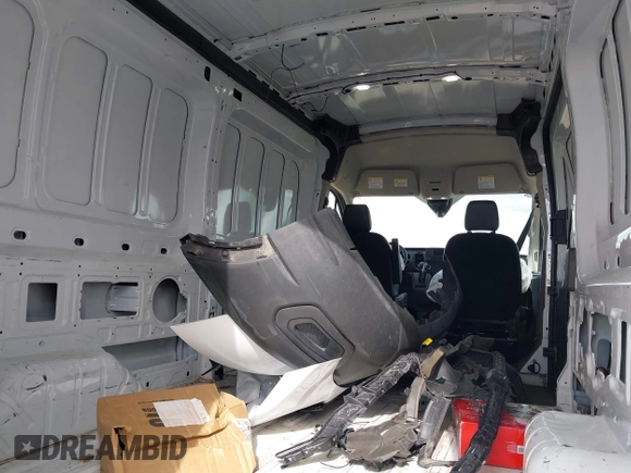 2024 Ford Transit Cargo z VIN 1FTBR1C84RKA32473, wystawiony jako IAAI lot #42438142 z przebiegiem 40 817 mil mil oraz . Historia ofert i sprzedaży dostępna na DreamBid. Obrazek 22.