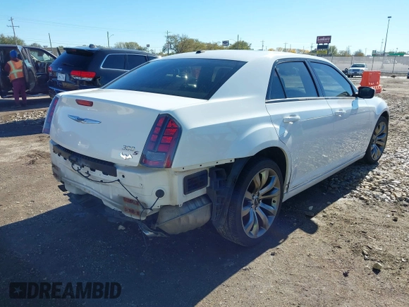2014 Chrysler 300 with VIN 2C3CCABG9EH286541, listed as a IAAI auction lot 40828693 with 143,343 mi miles. Bid and sale history available at carsss.com. Image 4.