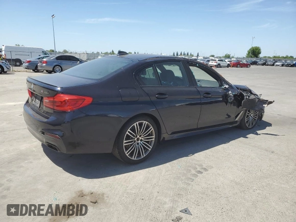 2019 BMW 5 Series M550i xDrive with VIN WBAJB9C5XKB287877, listed as a Copart auction lot 52994065 with 52,460 mi miles and Salvage title. Bid and sale history available at DreamBid. Image 3.