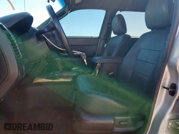 2011 Ford Escape Limited с VIN 1FMCU0EG3BKC18878, выставлен на аукционе Copart как лот 49438525 с пробегом 179 997 миль миль и Списание • Salvage title. История ставок и продаж доступна на DreamBid. Изображение 7.