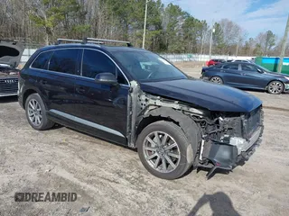 2019 Audi Q7 Premium with VIN WA1AAAF76KD001848, listed as a IAAI auction lot 41723857 with 71,899 mi miles and . Bid and sale history available at DreamBid. Image 1.