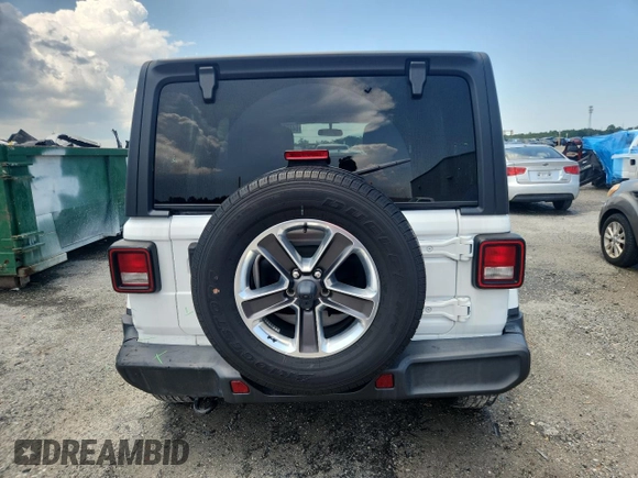 2020 Jeep Wrangler Unlimited Sahara with VIN 1C4HJXEN7LW165137, listed as a Copart auction lot 64458345 with 82,553 mi miles and Salvage title. Bid and sale history available at DreamBid. Image 6.