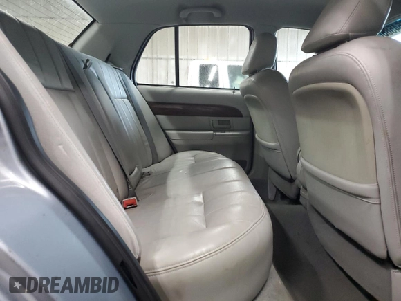 2003 Mercury Grand Marquis LS Premium z VIN 2MEHM75W33X645484, wystawiony jako Copart lot #58664585 z przebiegiem 145 064 mil mil oraz Czysty tytuł • Clean title. Historia ofert i sprzedaży dostępna na DreamBid. Obrazek 10.