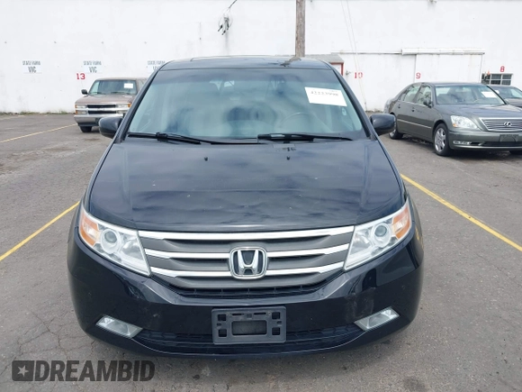 2012 Honda Odyssey Touring with VIN 5FNRL5H93CB121190, listed as a IAAI auction lot 42223998 with 154,358 mi miles and . Bid and sale history available at DreamBid. Image 12.