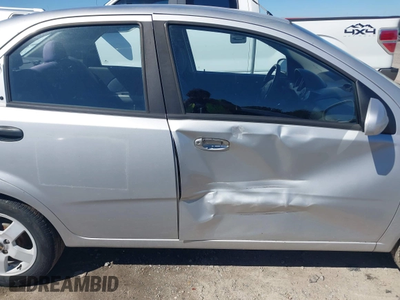 2006 Chevrolet Aveo LT z VIN KL1TG56656B636788, wystawiony jako IAAI lot #41771944 z przebiegiem 140 169 mil mil oraz . Historia ofert i sprzedaży dostępna na DreamBid. Obrazek 13.