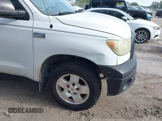 2010 Toyota Tundra with VIN 5TFLU5F10AX022832, listed as a IAAI auction lot 42504366 with 223,392 mi miles and . Bid and sale history available at DreamBid. Image 17.