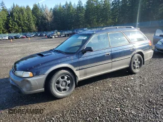 1997 Subaru Legacy Outback with VIN 4S3BG6854V7632280, listed as a Copart auction lot 50452265 with 184,027 mi miles and Salvage title. Bid and sale history available at DreamBid. Image 1.