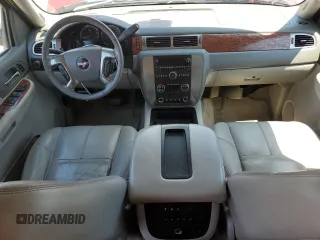2007 GMC Yukon SLT z VIN 1GKFK13087J294570, wystawiony jako Copart lot #57968375 z przebiegiem 185 186 mil mil oraz Czysty tytuł • Clean title. Historia ofert i sprzedaży dostępna na DreamBid. Obrazek 8.