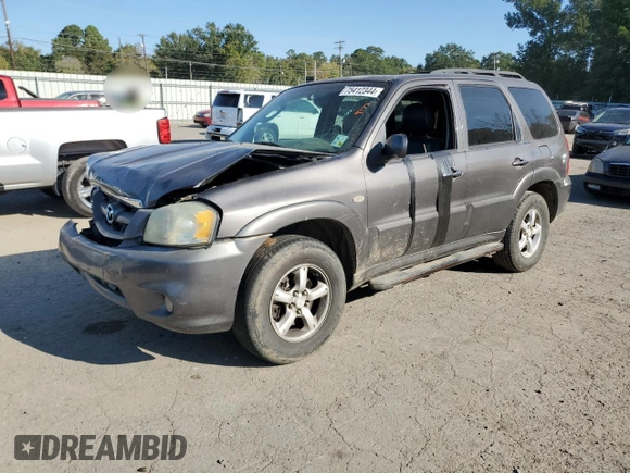 2006 Mazda Tribute S with VIN 4F2YZ06136KM31485, listed as a Copart auction lot 75412344 with Not Provided miles and Salvage Title. Bid and sale history available at DreamBid. Image 1.