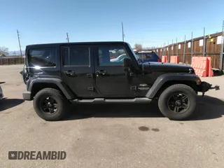 2015 Jeep Wrangler Unlimited Sahara with VIN 1C4BJWEG0FL568237, listed as a IAAI auction lot 41697726 with 82,751 mi miles. Bid and sale history available at carsss.com. Image 13.
